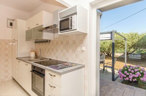 Apartment (A3) | Private kitchen | Fridge, stovetop, espresso maker, coffee/tea maker - Apartments Blazica (Vodice)