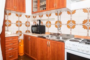 Cuisine privée | Réfrigérateur, un four, surface de cuisson, cafétière à espresso