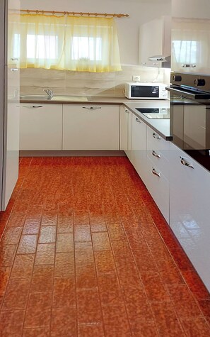 Apartment (A2) | Private kitchen | Fridge, stovetop, coffee/tea maker, electric kettle