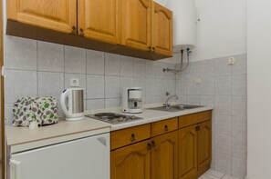Cozinha privada | Geladeira, cooktop, máquina de café expresso, cafeteira/chaleira