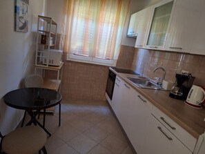 Apartment (A1) | Private kitchen | Fridge, oven, stovetop, espresso maker