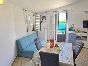 Apartment (A1) | Wohnzimmer | Fernseher