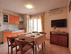 Apartment (A4) | Private kitchen | Fridge, stovetop, cookware/dishes/utensils, freezer - Apartments Vladimir (Vodice)