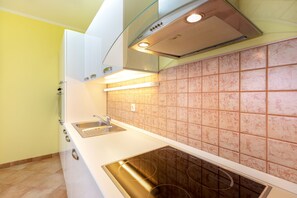 Apartment (A3) | Private kitchen | Fridge, oven, stovetop, cookware/dishes/utensils - Apartments Maja (Rogoznica)