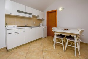 Apartment (A10) | Private kitchen | Fridge, stovetop, espresso maker, cookware/dishes/utensils