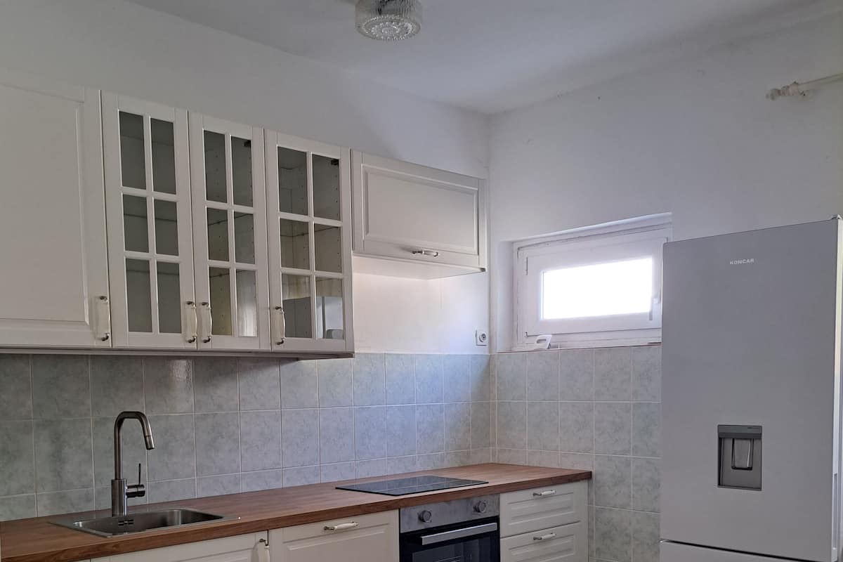 Appartement (A1) | Cuisine privée | Réfrigérateur, plaque de cuisson