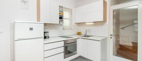 Maison | Cuisine privée | Réfrigérateur, un four, surface de cuisson, lave-vaisselle