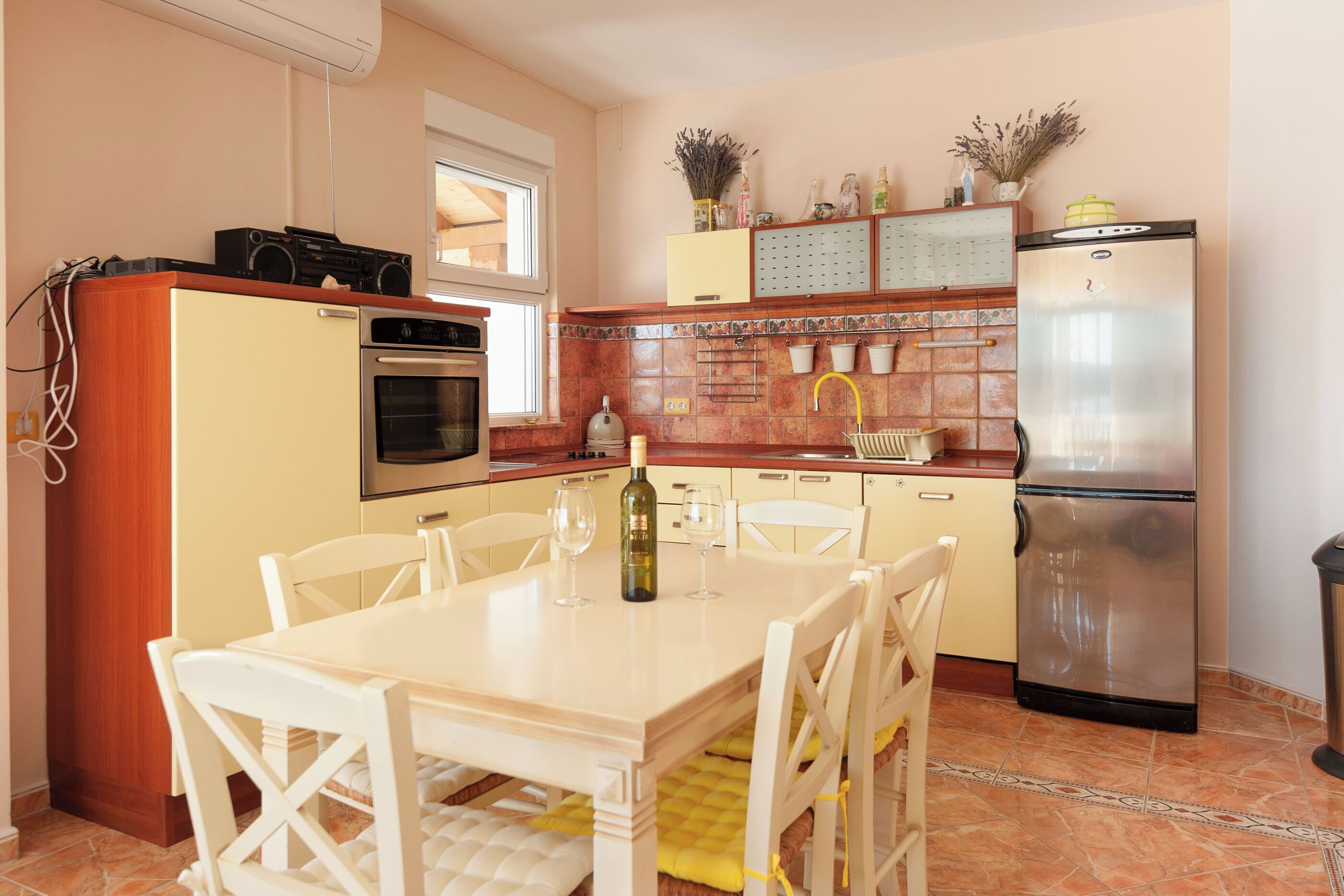 Apartamento (A1) | Cocina privada | Frigorífico, horno, placa de cocina y máquina de café espresso
