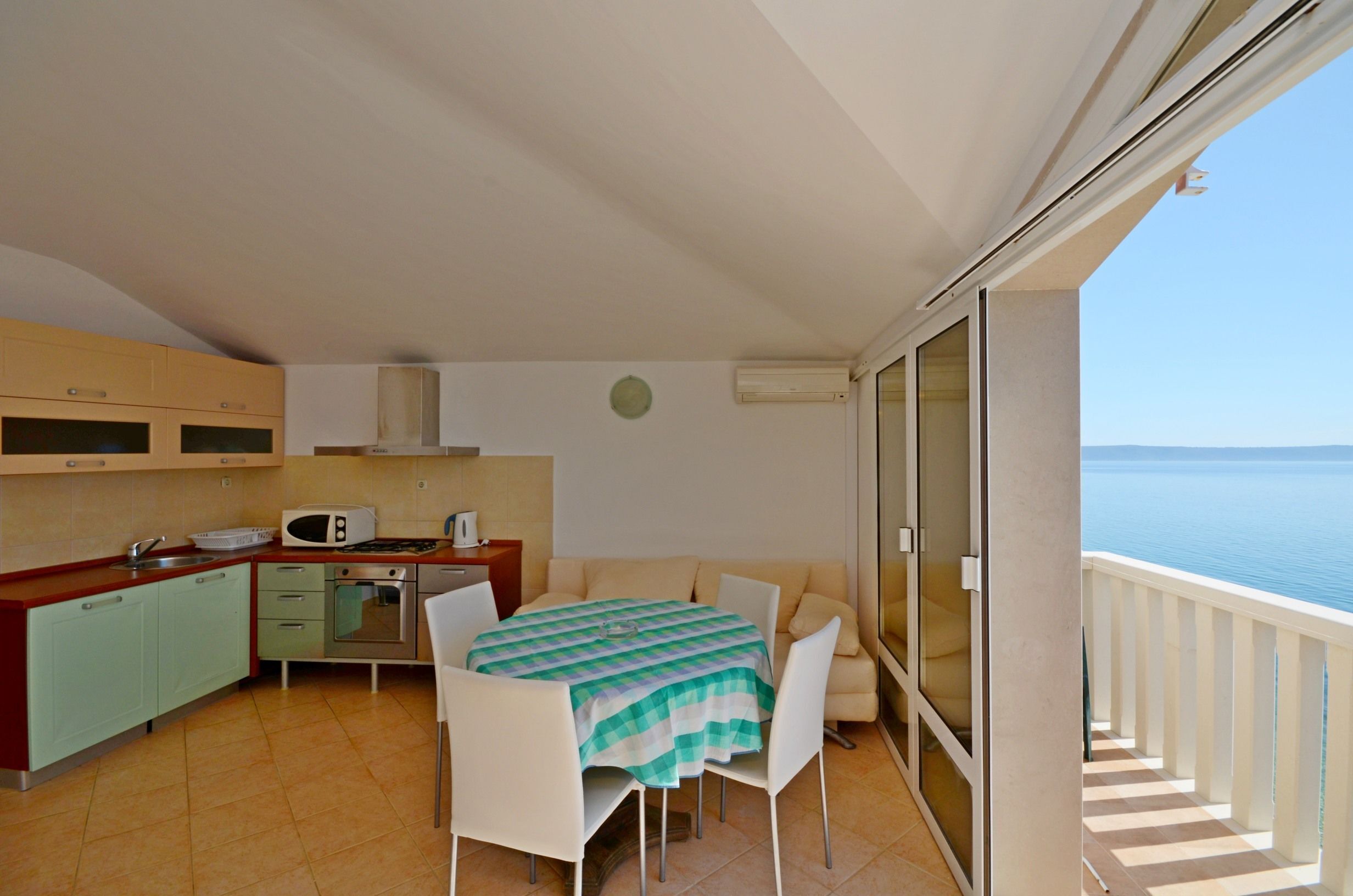 Apartment (A4) | Private kitchen | Fridge, microwave, stovetop, electric kettle