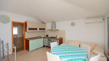 Apartment (A4) | Private kitchen | Fridge, microwave, stovetop, electric kettle