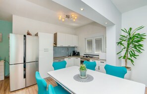 Apartment (A3) | Private kitchen | Fridge, stovetop, electric kettle, cookware/dishes/utensils - Apartments Katica (Makarska)