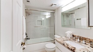 Bathtub, hair dryer, towels