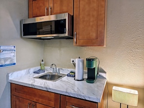 Fridge, microwave, coffee/tea maker, electric kettle
