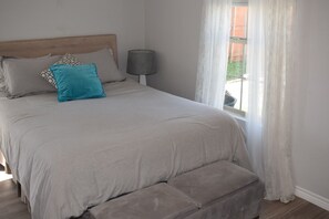 Ferros/tábuas de passar roupa, acesso à internet, roupa de cama