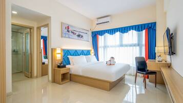 Premium bedding, individually decorated, individually furnished, desk