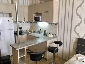 Fridge, microwave, stovetop, electric kettle