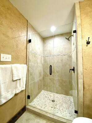 Shower, hair dryer, towels, soap