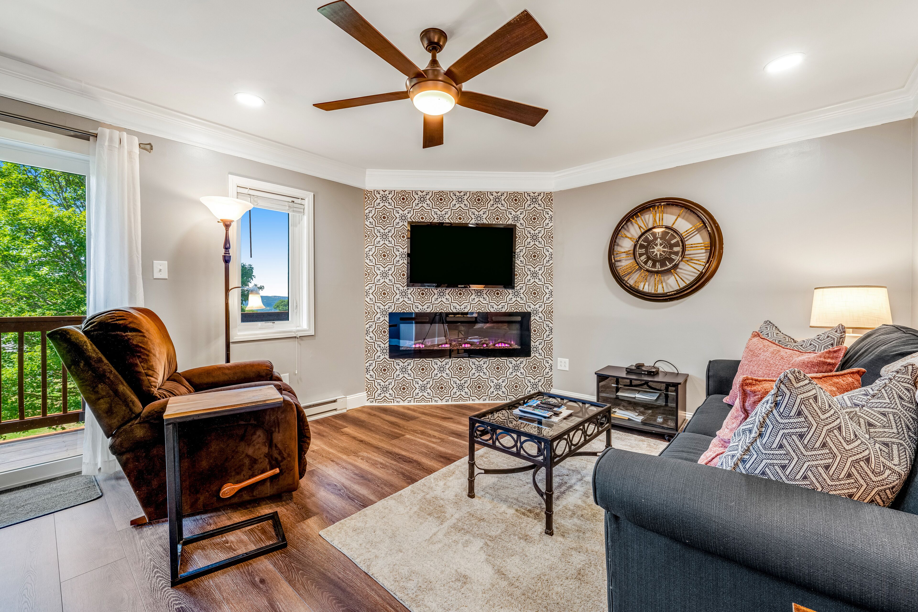 TV, fireplace, books