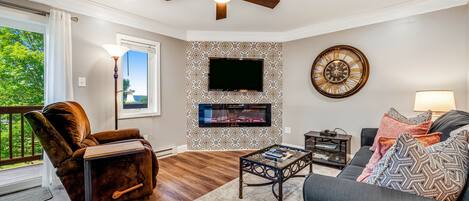 TV, fireplace, books