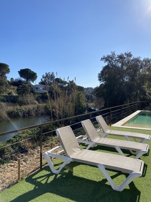 Property grounds - Casa Rio de Oro with pool featuring beach area and barbecue. Calonge Costa Brava (Calonge)