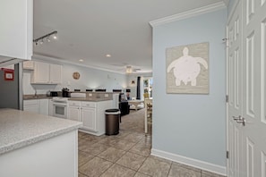 Fridge, microwave, oven, stovetop - Turtle Cove: Family-friendly Condo within Steps of Pool. Easy Walk to Beach and (Oak Island)
