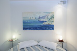 1 dormitorio, tabla de planchar con plancha, wifi gratis y ropa de cama