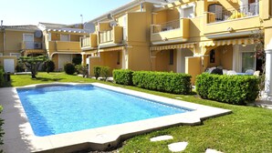 A residential building with a swimming pool, balconies, and well-maintained gardens. - aldeamar, bungalow - 2 bedrooms in quiet urbanization. (Els Poblets)