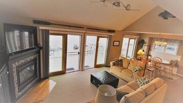 Smart TV, fireplace, DVD player, books
