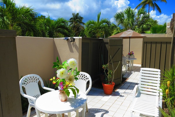Private, furnished, tropical garden patio.