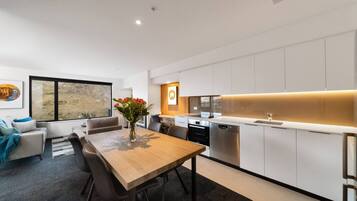 Coffee/tea maker, fridge, microwave, oven