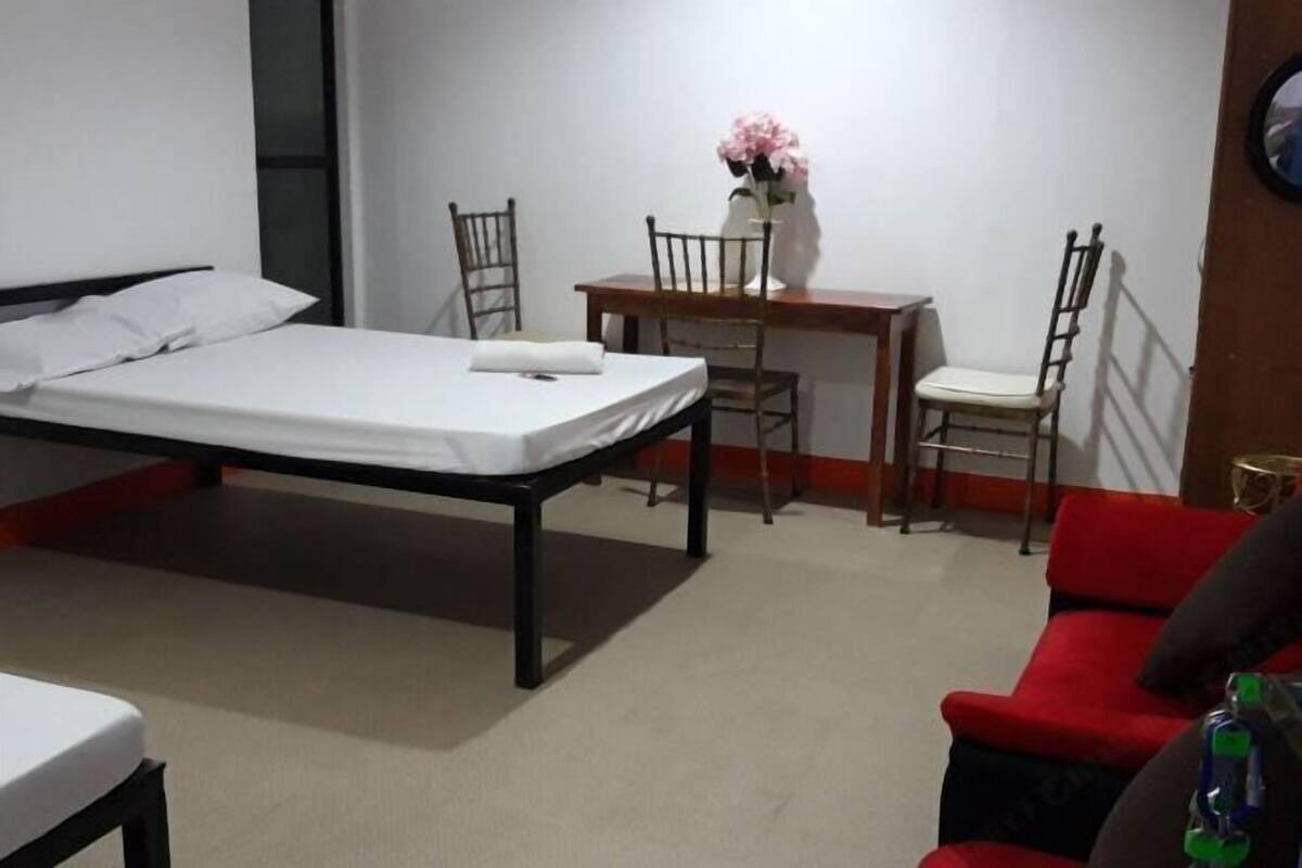 Desk, laptop workspace, free WiFi, bed sheets