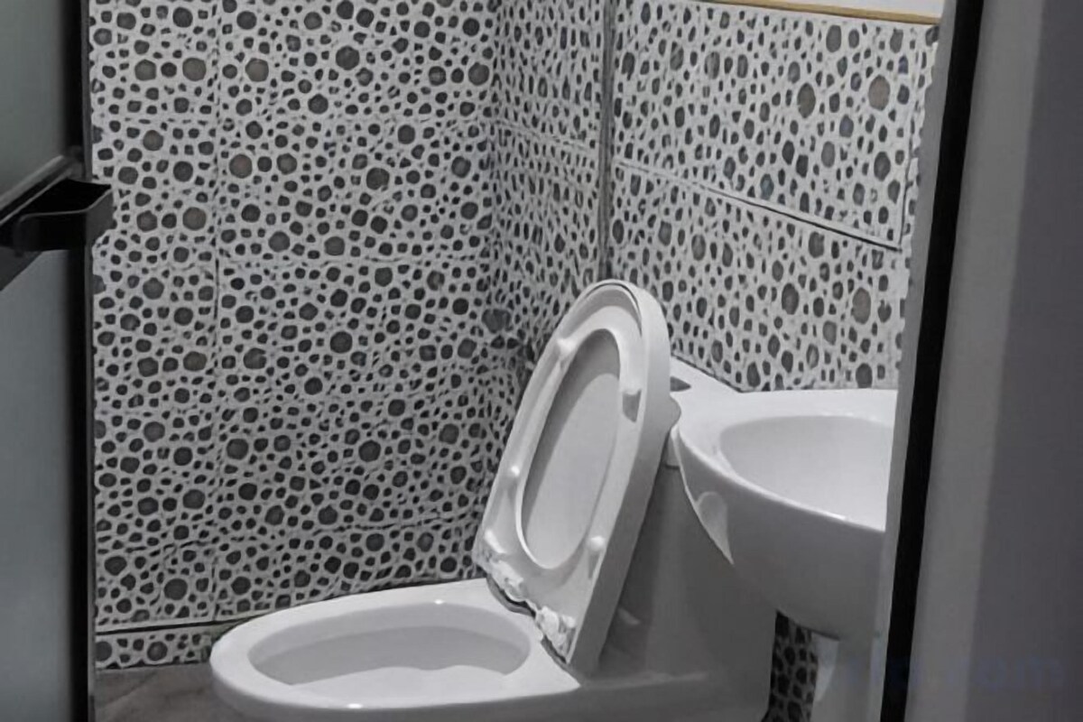 Ducha, toallas, jabón, shampoo