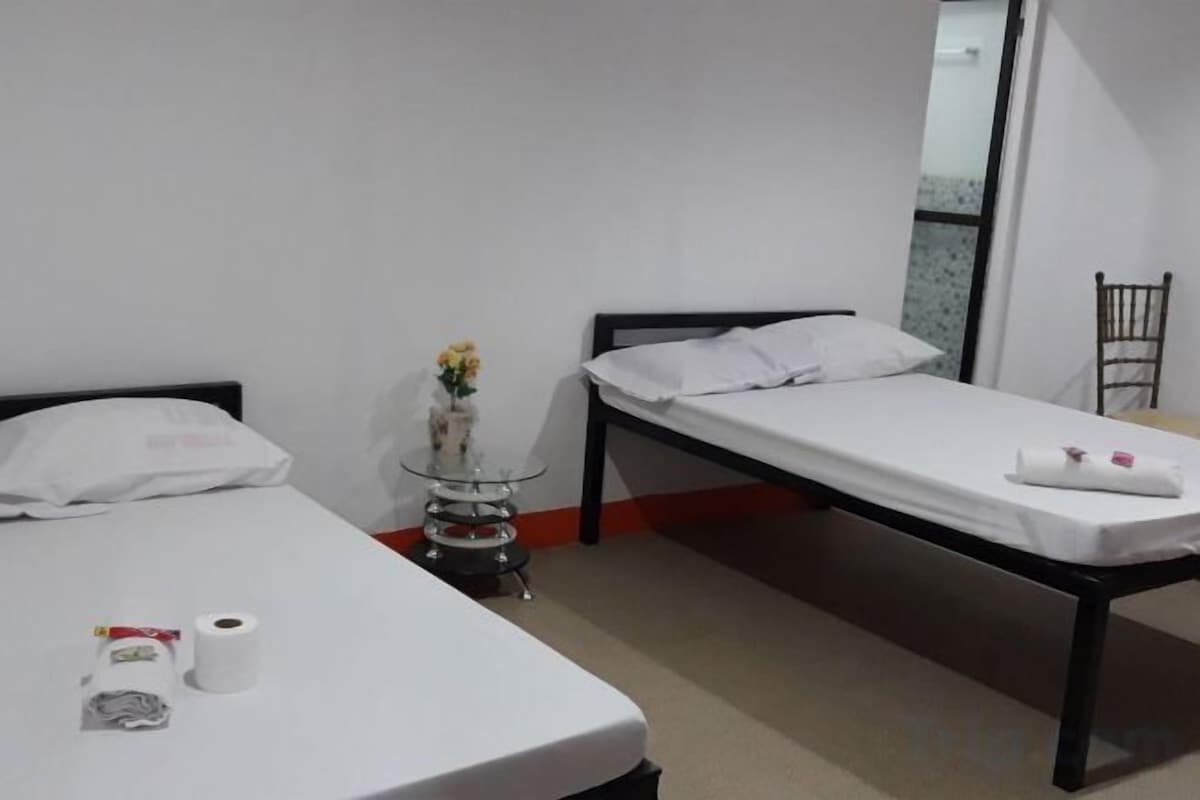Desk, laptop workspace, free WiFi, bed sheets