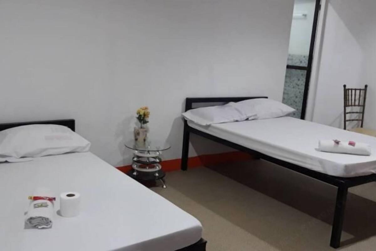 Desk, laptop workspace, free WiFi, bed sheets