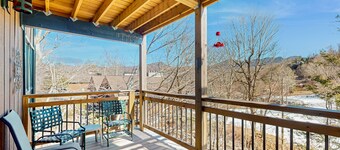 Ski In/Out mountain front condo w/ balcony views and a stone fireplace