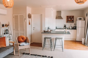 Fridge, microwave, stovetop, coffee/tea maker