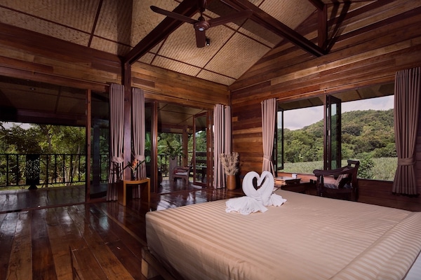 Stylish loft in stilted wooden longhouse