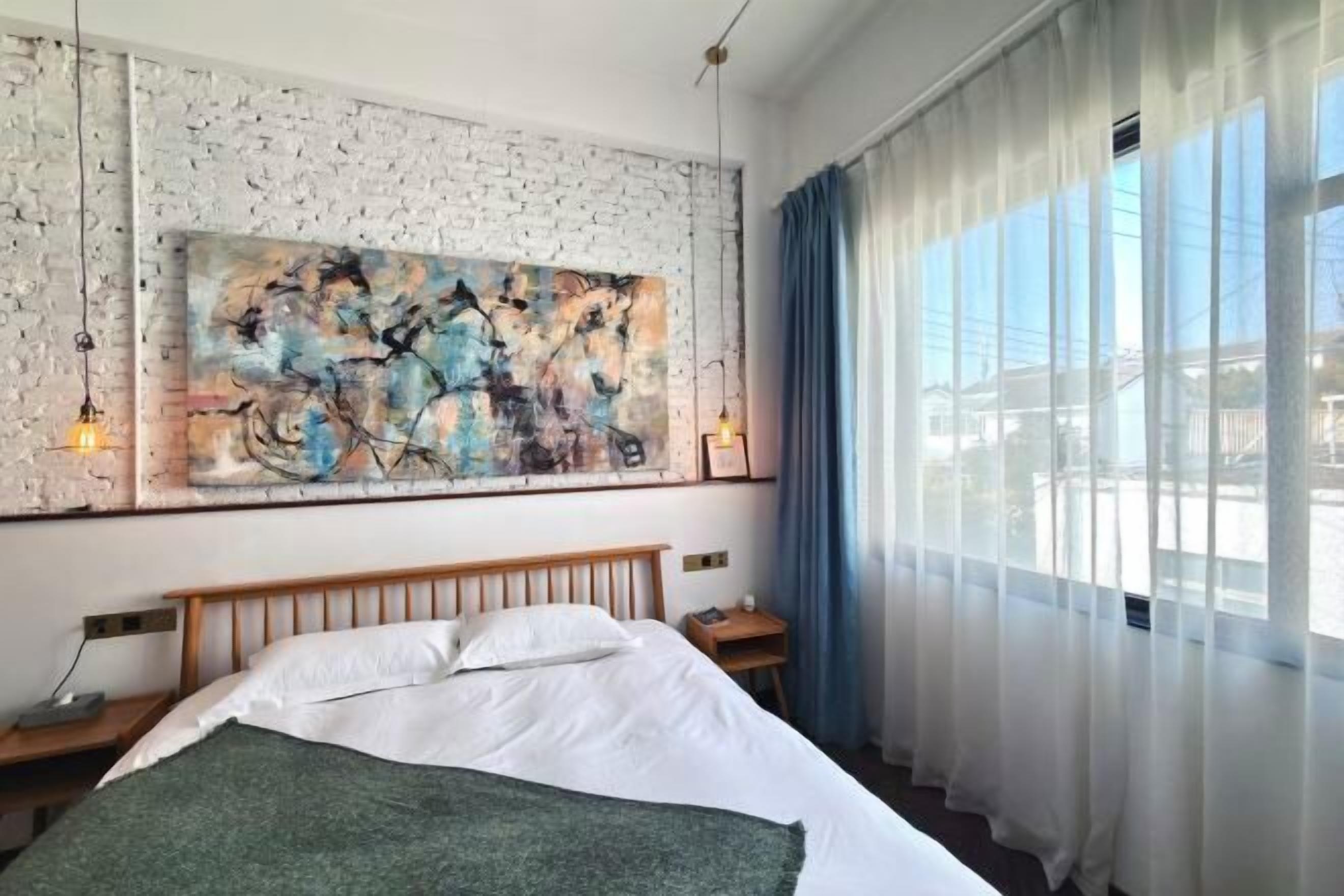 Individually decorated, individually furnished, desk, blackout drapes