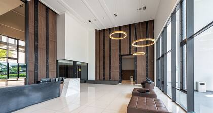 Suite Mario avec lien MRT direct et profitez d'une piscine à débordement de 50 m