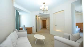 Deluxe Double Room, Sea View | Living area | Flat-screen TV