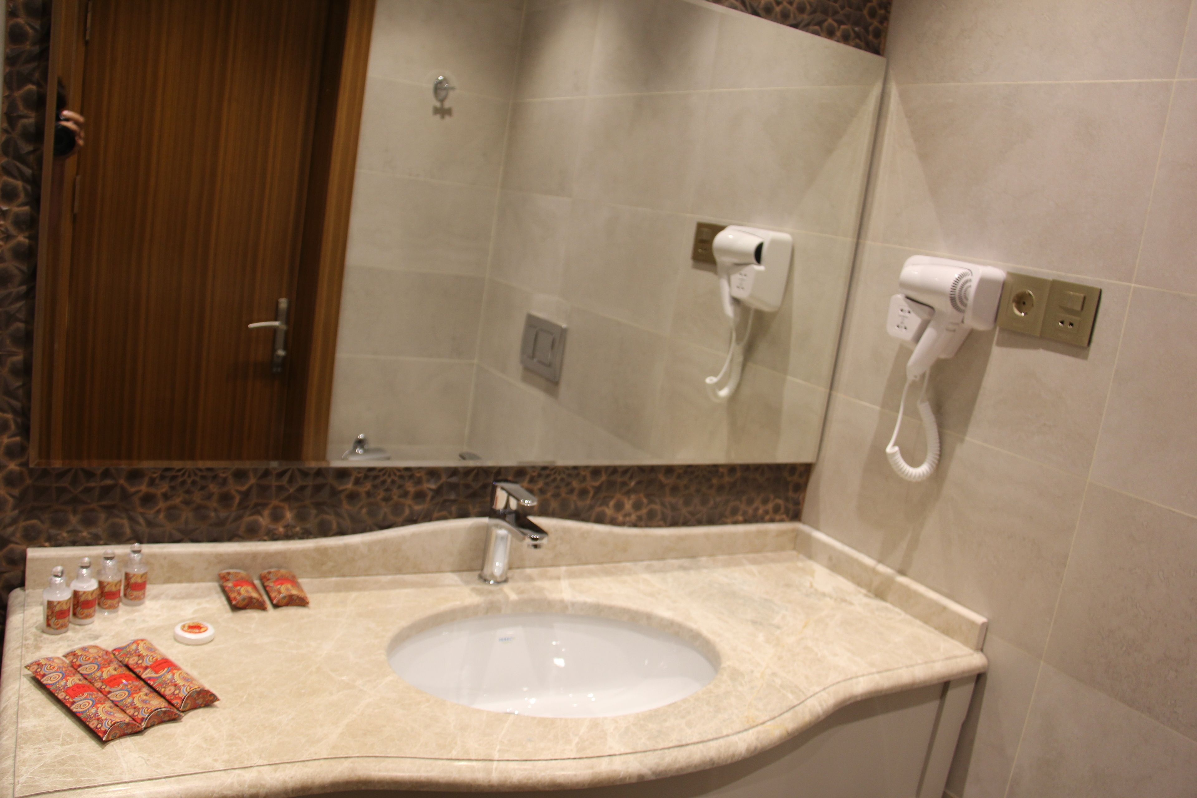 free toiletries, hair dryer, slippers, towels