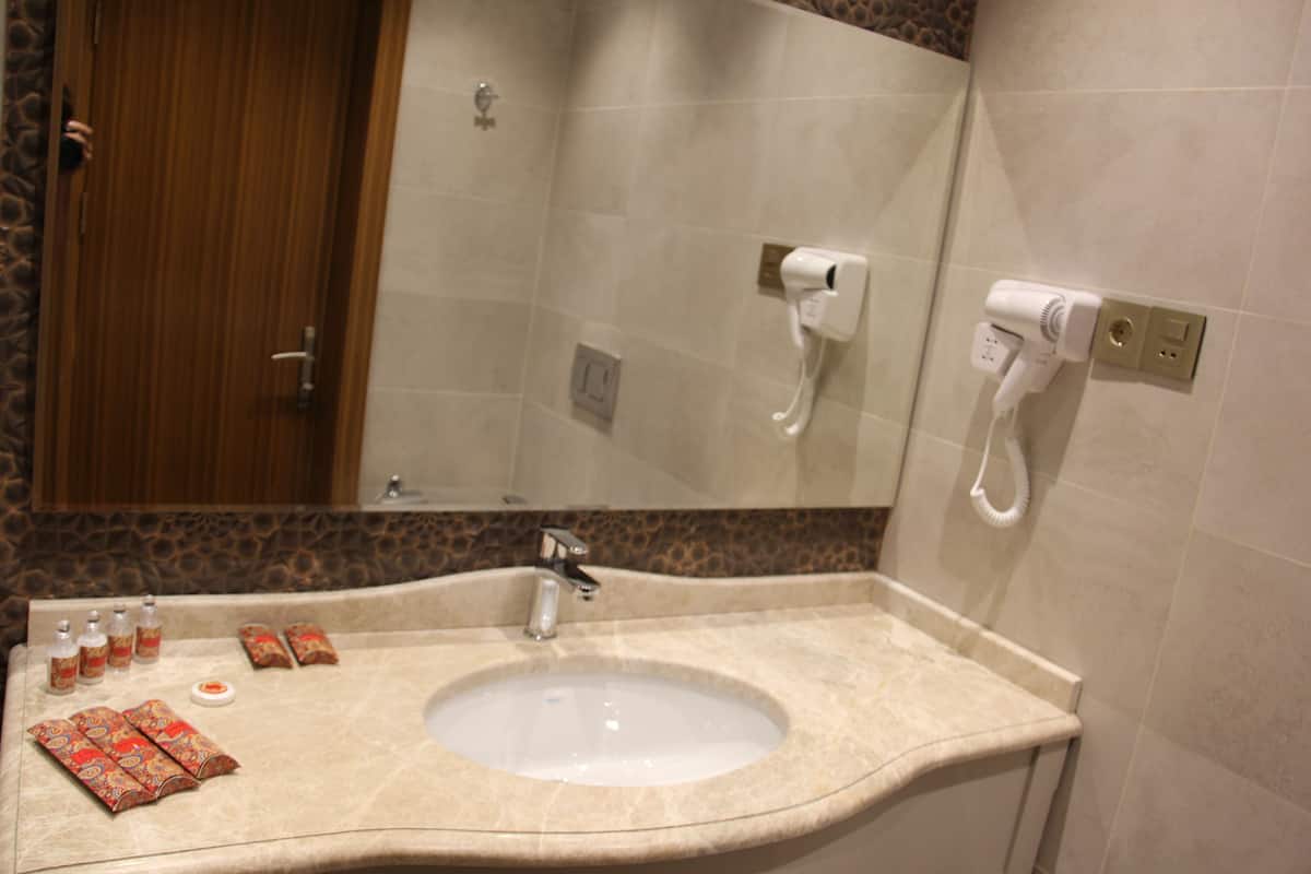 free toiletries, hair dryer, slippers, towels