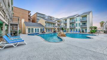 A heated pool, pool loungers