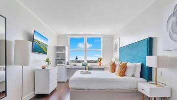 Iron/ironing board, travel crib, WiFi, bed sheets