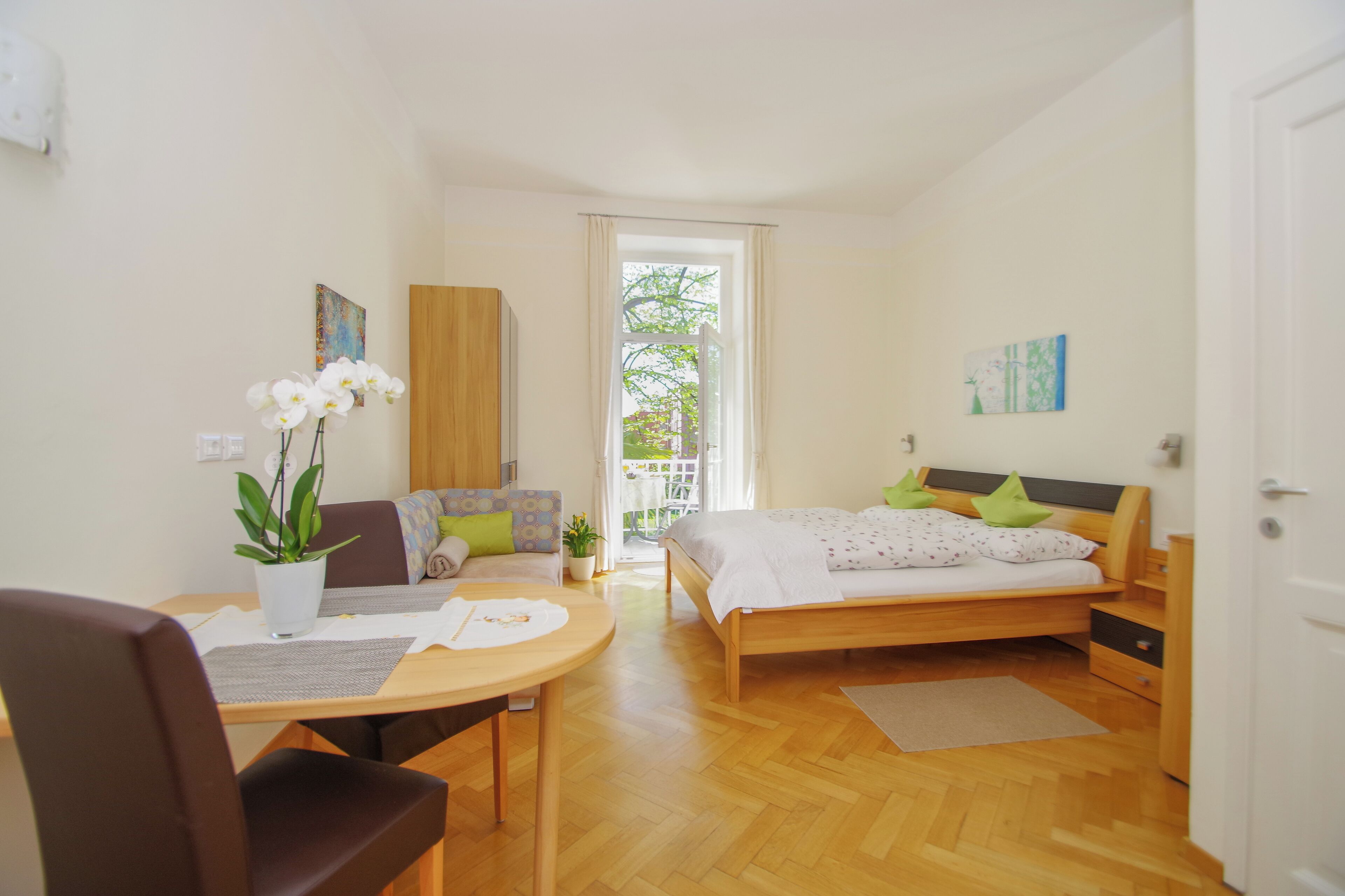 Romantic Apartment, Balcony, Garden Area | Living area | 50-inch LED TV with satellite channels