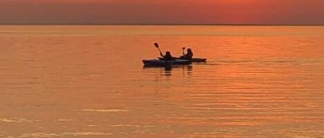On the beach, sun-loungers