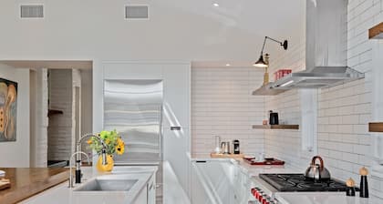 Expansive and Modern Home With Pool and Tennis Court!