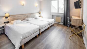 Kamar Triple Klasik | Meja kerja, tempat tidur bayi gratis, Wi-Fi gratis, dan seprai linen