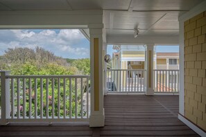Terrace/patio - Greyt Escape: Lovely, Ocean View Condo Across from OKI Pier with Community Pool, (Oak Island)