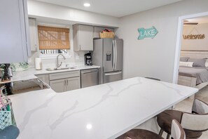 Fridge, microwave, oven, stovetop - Stunning Renovated 3BR Condo w/ Huge Deck & the Best Open-Water View on the Lake (Lake Ozark)